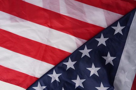 Concept of US Independence day or Memorial day. National flag over bright marble table background.