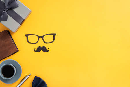 Father's day gift idea design concept with gift box on yellow background.