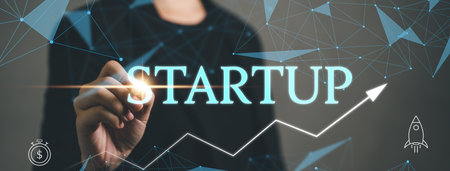 Startup business design concept, bussinesswoman touching darts aiming at the target and vision.の写真素材