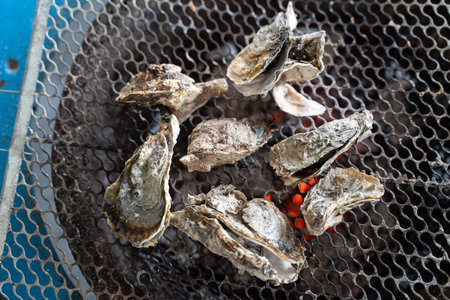Grilled fresh oyster in Tainan, Taiwan, the famous Taiwanese street food gourmet.の写真素材