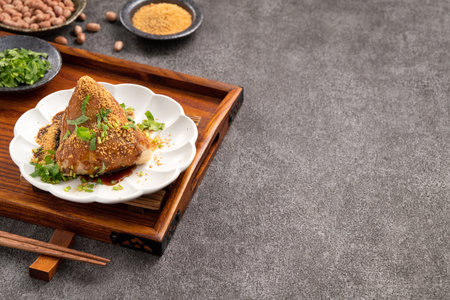 Vegetable zongzi. Vegetarian rice dumpling for traditional Chinese Duanwu Dragon Boat Festival food with glutinous rice, peanuts, and coriander.の写真素材