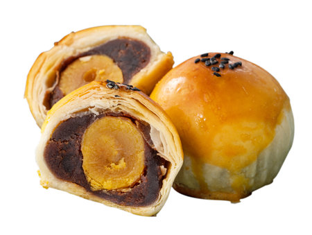 Close up of Moon cake yolk pastry, mooncake for Mid-Autumn Festival holiday isolated on white table background.の写真素材