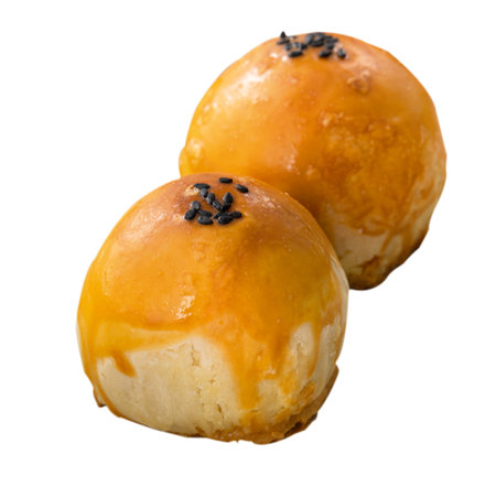 Close up of Moon cake yolk pastry, mooncake for Mid-Autumn Festival holiday isolated on white table background.の写真素材