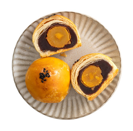 Close up of Moon cake yolk pastry, mooncake for Mid-Autumn Festival holiday isolated on white table background, clipping path, cut out.の写真素材