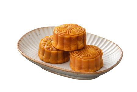 Delicious Cantonese moon cake for Mid-Autumn Festival food mooncake isolated on white background for afternoon tea, holiday celebration serving.の写真素材