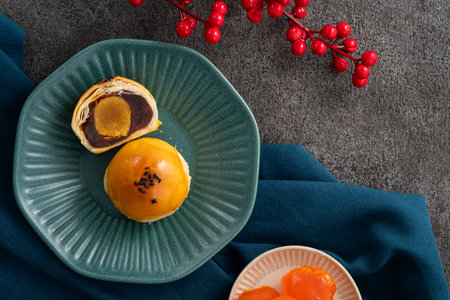Moon cake yolk pastry, mooncake for Mid-Autumn Festival holiday on gray table backgroundの写真素材