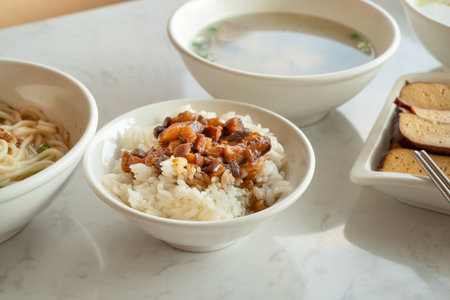Braised meat rice, stewed pork over cooked rice in Taiwanese restaurant.の写真素材