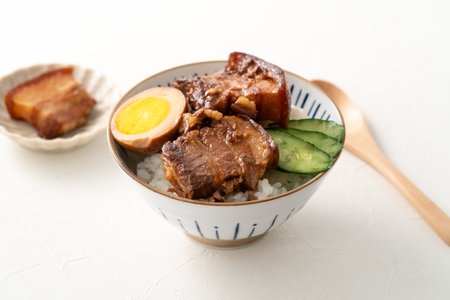 Braised pork belly meat rice, stewed pork over cooked rice in Taiwanese restaurant.の写真素材