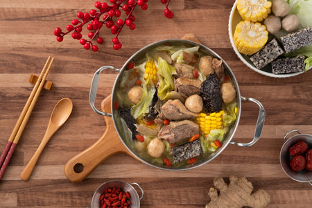 Delicious ginger duck stew hot pot soup with fresh vegetables in Taiwan.の写真素材