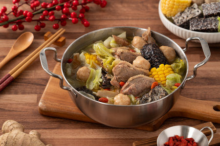 Delicious ginger duck stew hot pot soup with fresh vegetables in Taiwan.の写真素材