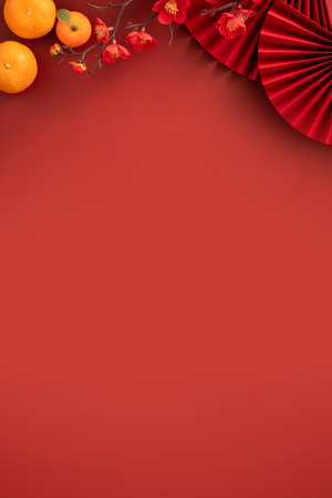 Chinese lunar new year background with fresh tangerine, red envelope, paper fan and decorations for Spring Festival.の写真素材