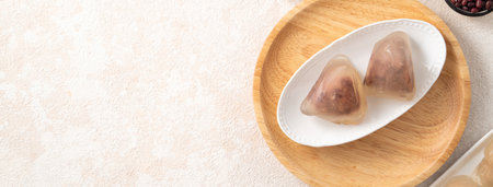 Zongzi, crystal ice rice dumpling for Dragon Boat Festival food with sweet bean paste filling.の写真素材