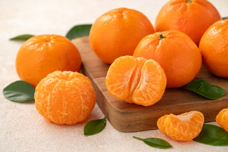 Fresh juice small tangerine mandarin orange in a plate on white table background.の写真素材
