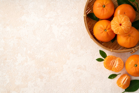 Fresh juice small tangerine mandarin orange in a plate on white table background.の写真素材