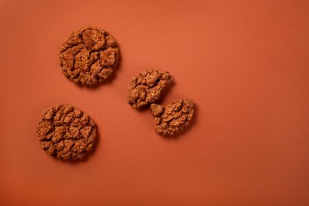 Chocolate brown cookies on brown backgroubdの写真素材