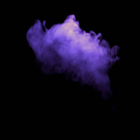 Misty violet helloween fog smoke, isolated on blackの写真素材