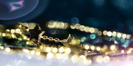 Golden star with bokeh background, festive bannerの写真素材