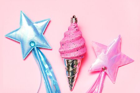 Candy pink blue stars with ice cream flat lay on rose backgroundの写真素材