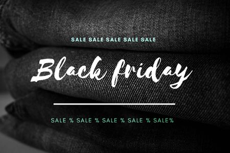 Black friday sale text on black jeans denim textile backgroundの写真素材