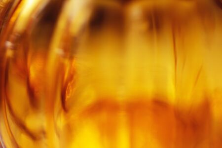 Golden abstract glass shiny blurred background, bannerの写真素材