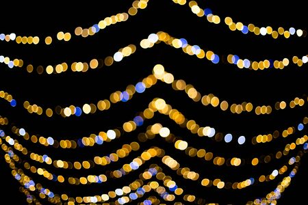 Christmas led lights garland isolated on blackの写真素材