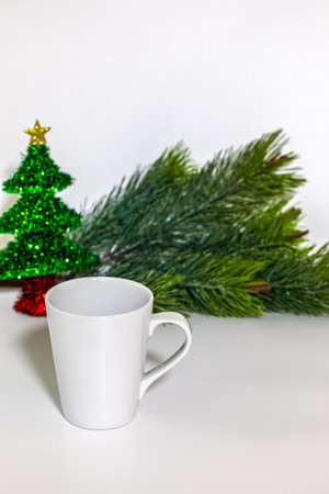 White mug on white background with christmas elements conceptの写真素材