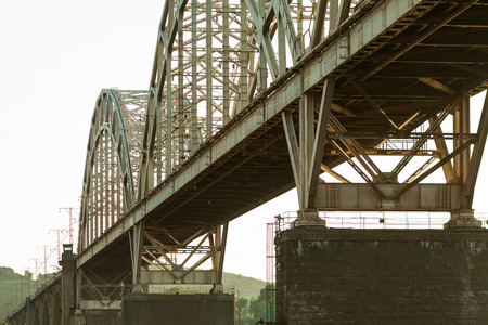 Railroad bridge. Industrial wallpapers. Riveted steel structuresの写真素材