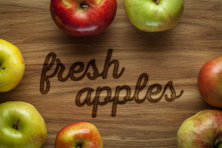 Apples on wooden backgroundの写真素材