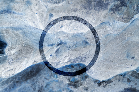 Dark flat circle on abstract stone background. Abstract psychedelic background.の写真素材