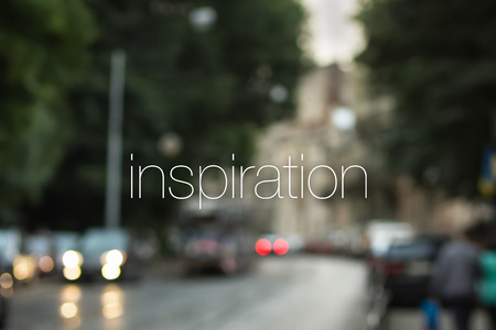 Inspiration card with blurry cityscape background.の写真素材