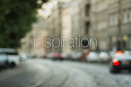 Inspiration card with blurry cityscape background.の写真素材