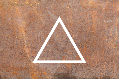 White flat triangle on abstract metal background. Abstract psychedelic background.の写真素材