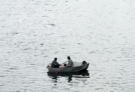 Two people in a boat.の写真素材
