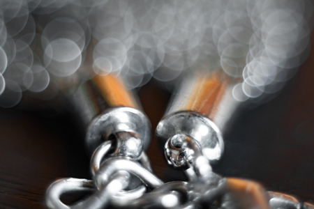 A fragment of a decorative female bracelet. Ambient jewelry wallpaperの写真素材