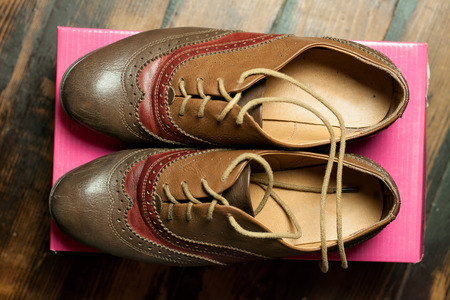 A pair of women's shoes. Top view. Hipster clothing background.の写真素材