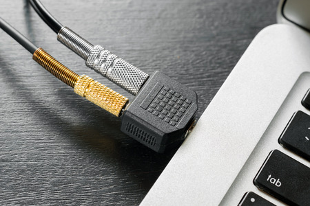 audio splitter is connected to a laptopの写真素材