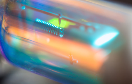 Blurry abstract futuristic wallpaper. Car headlight macro.の写真素材