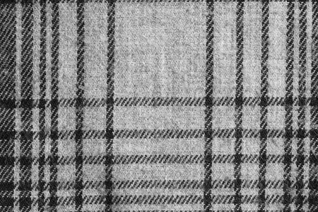 Texture of grey checkered fabric. Cotton fabric close-up.の写真素材