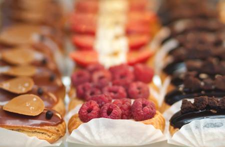 Delicious appetizing brewed cakes. Sweet glazed pastries close-up.の写真素材