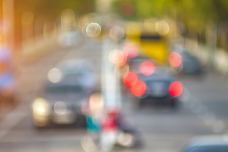 Blurred background photo. Summer blurry city backdrop.の写真素材