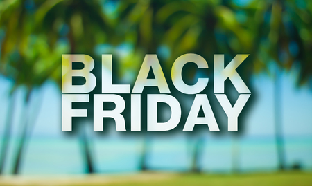 Black friday poster. Blurry palm trees on background.の写真素材