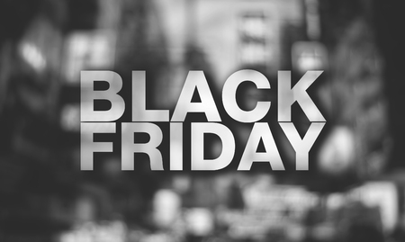 Black friday poster. Blurry cityscape backgroundの写真素材