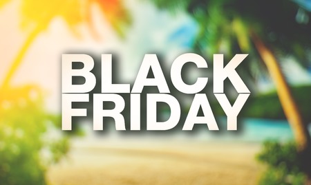 Black friday poster. Blurry palm trees on background.の写真素材