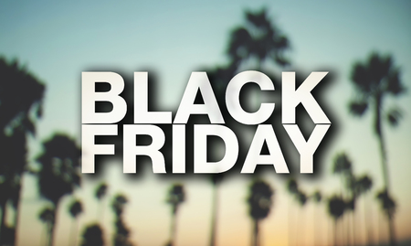 Black friday poster. Blurry palm trees on background.の写真素材