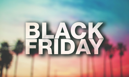 Black friday poster. Blurry palm trees on background.の写真素材