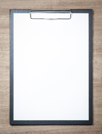Blank clipboard on wooden background. Business conceptの写真素材