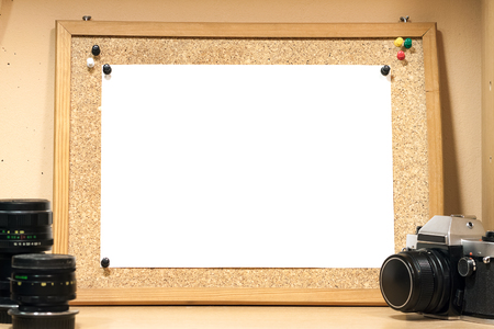 A cork board with a white sheet of paper. Background for mockup.の写真素材