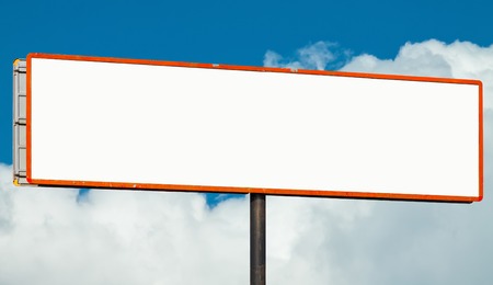Ultra-wide blank horizontal billboard against a blue sky. Background for mock-up.の写真素材
