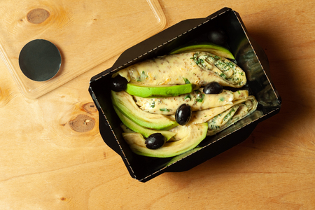 Rolls with cottage cheese, spices, avocados and olivesの写真素材