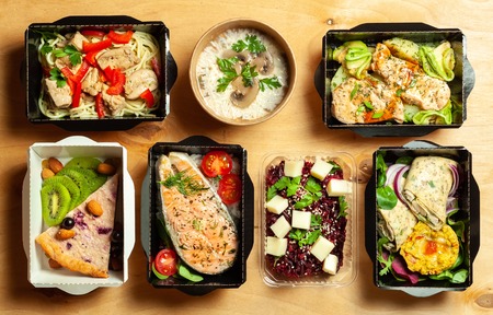 A full daily diet of healthy eating. Food in cardboard boxes. Flat Lay.の写真素材